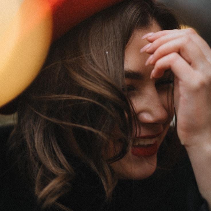 Jordan Lee, Lead Design Curator at Crest Forge Market, reviewing corporate floral arrangements